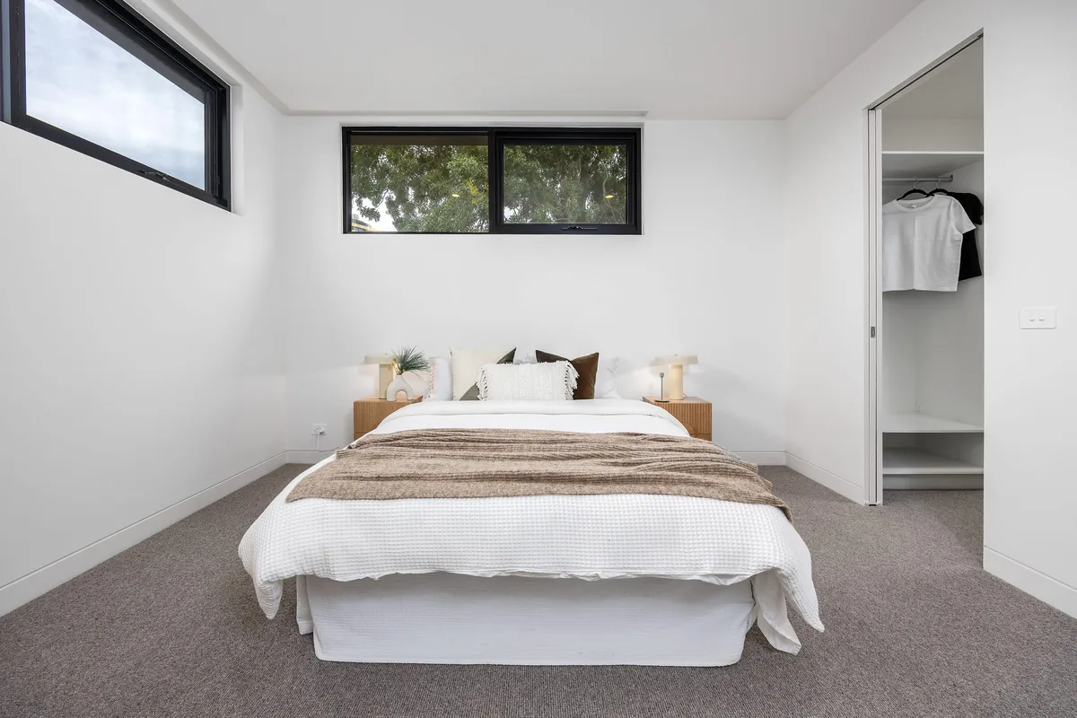 The same bedroom tidied and clear